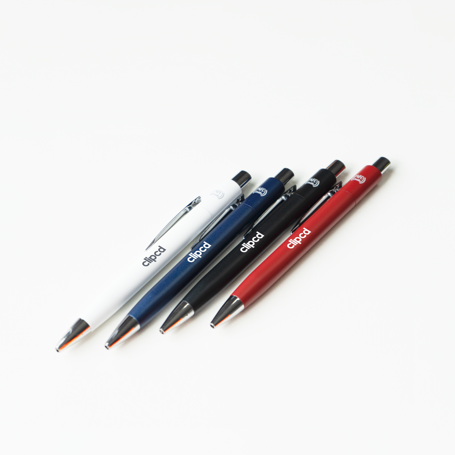 Four SmartScribe Re-AL NFC promo products in white, blue, black, and red showing the 'clipcd' branding and NFC logo. Sold by CostSmart